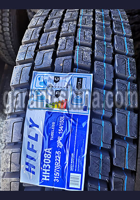 Hifly HH308 (приводная) 315/70 R22.5 154/150L 20PR - Фото протектора с этикеткой вблизи